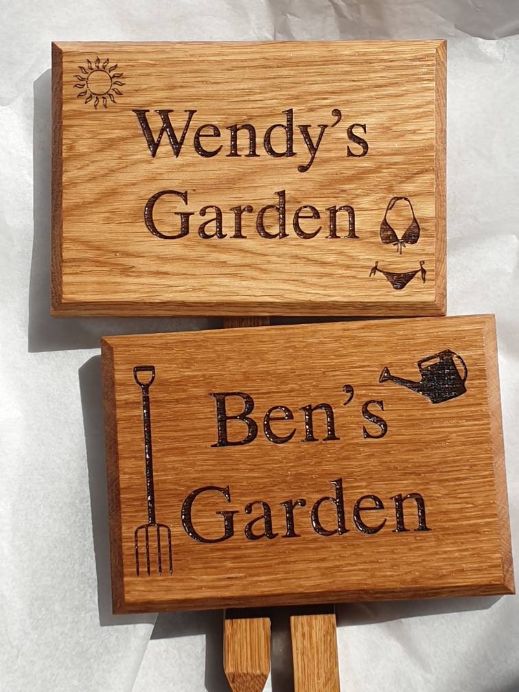 Personalised engraved garden sign with ground stake attached.  Made from solid oak Text and images can be added.