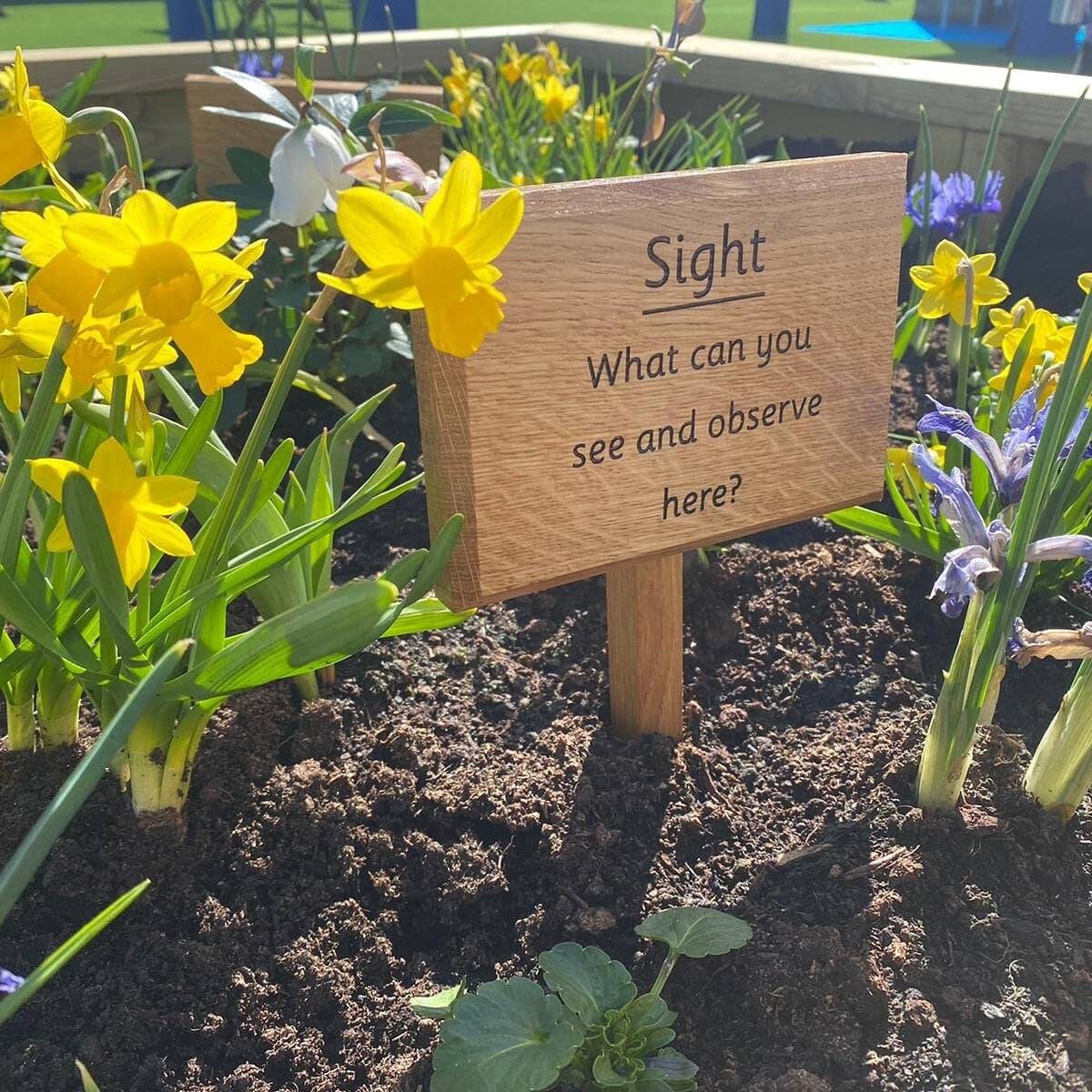 Personalised engraved garden sign with ground stake attached.  Made from solid oak Text and images can be added.