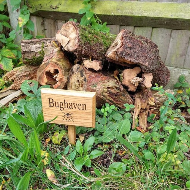 Personalised engraved garden sign with ground stake attached.  Made from solid oak Text and images can be added.