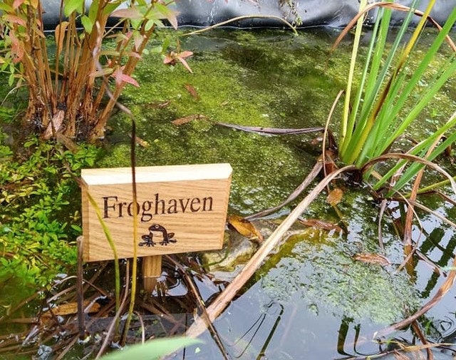 Personalised engraved garden sign with ground stake attached.  Made from solid oak Text and images can be added.
