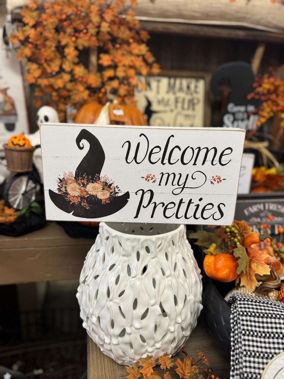 Welcome my pretties sign